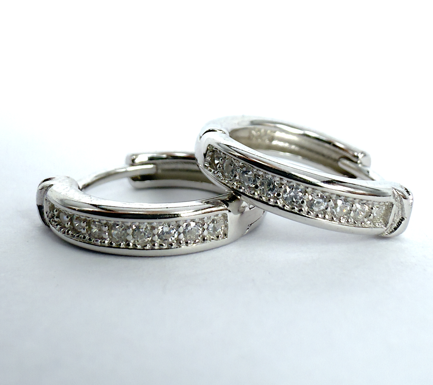 Sterling Silver Huggie Earrings with AAA Grade Cubic Zirconia