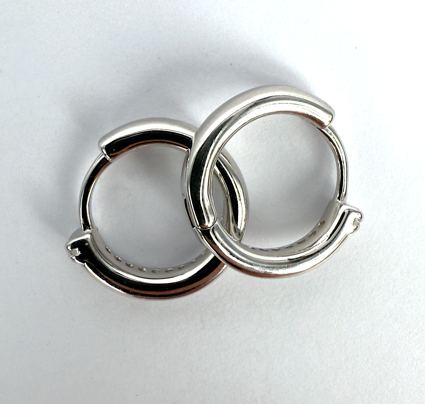 Sterling Silver Huggie Earrings with AAA Grade Cubic Zirconia