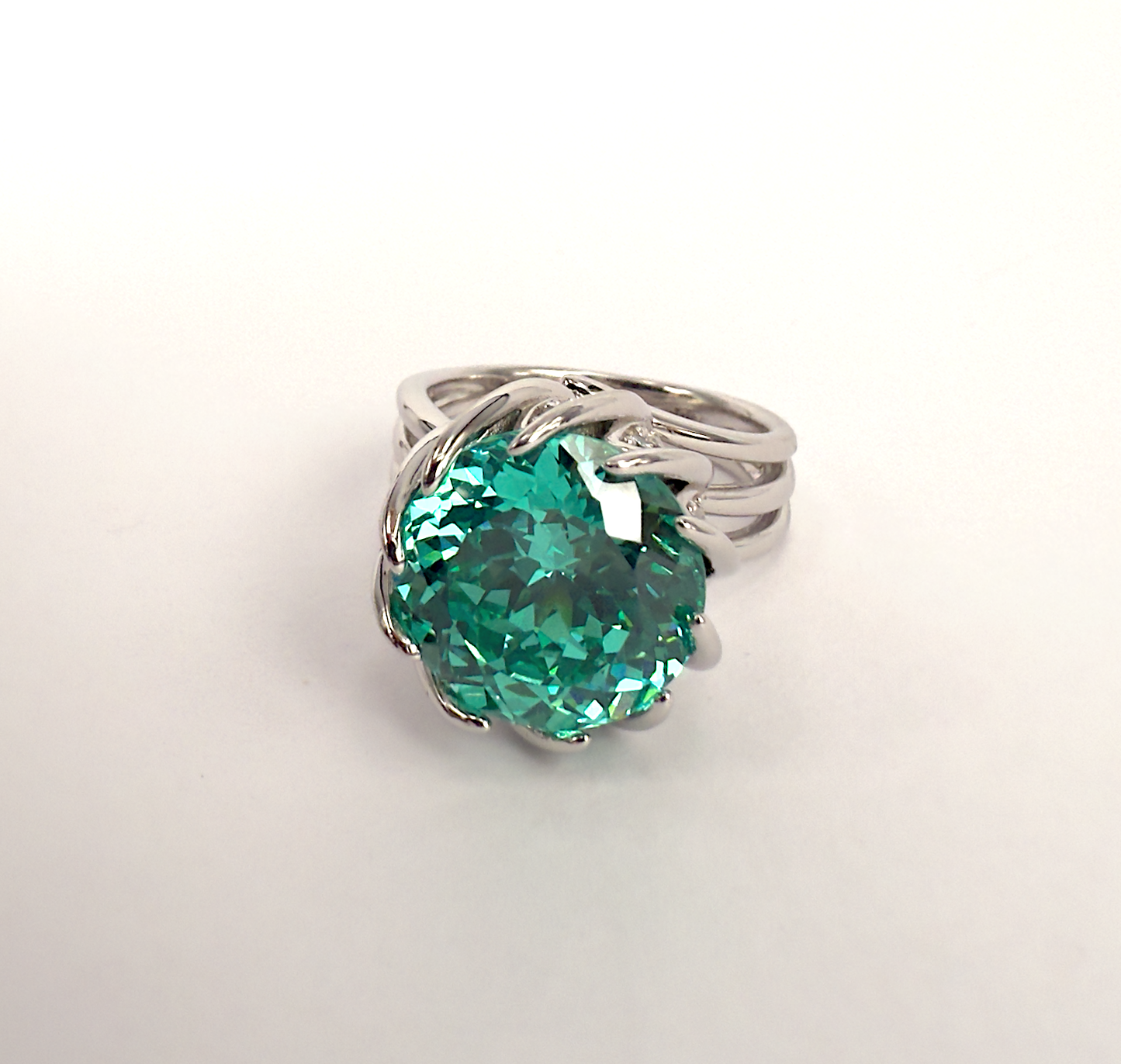 Sterling Silver Spiral Ring with Forest Green Cubic Zirconia