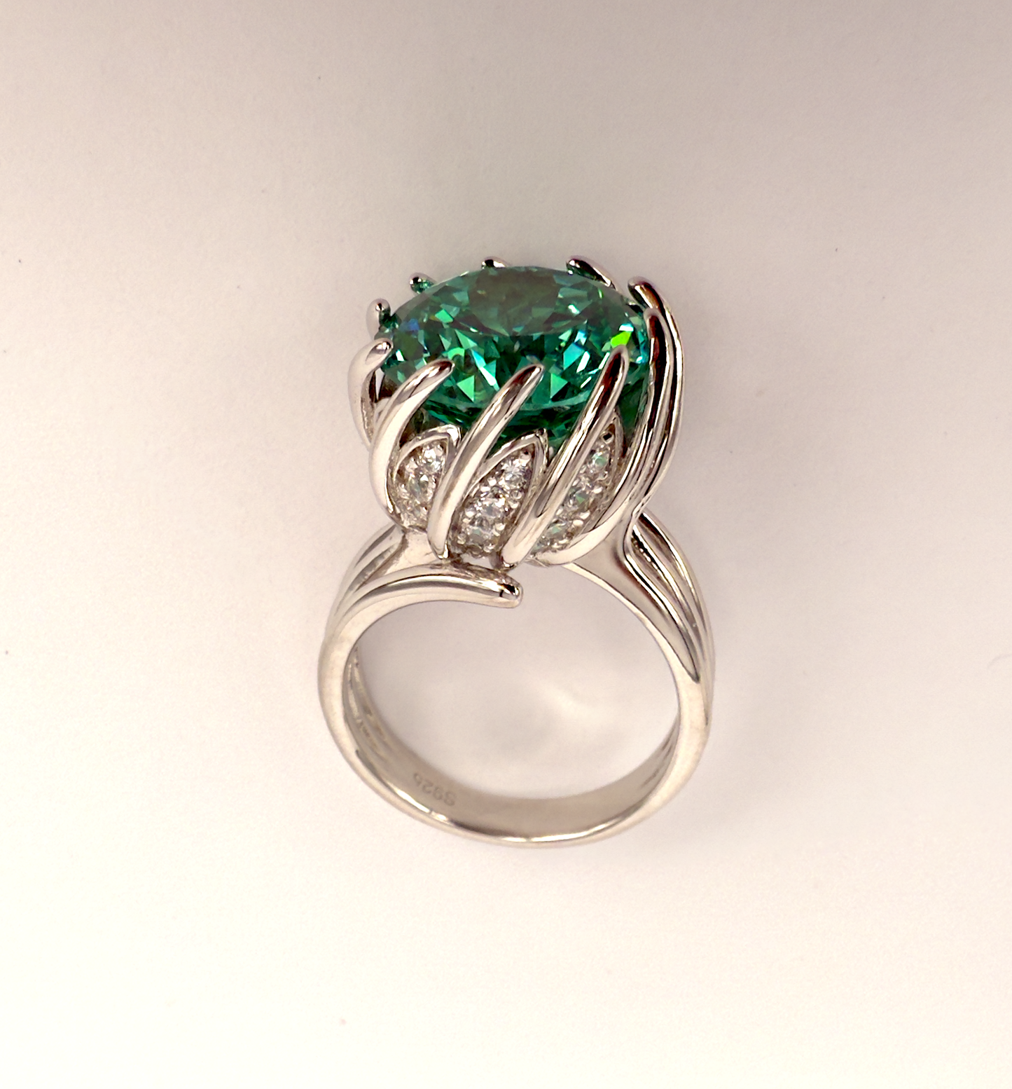 Sterling Silver Spiral Ring with Forest Green Cubic Zirconia