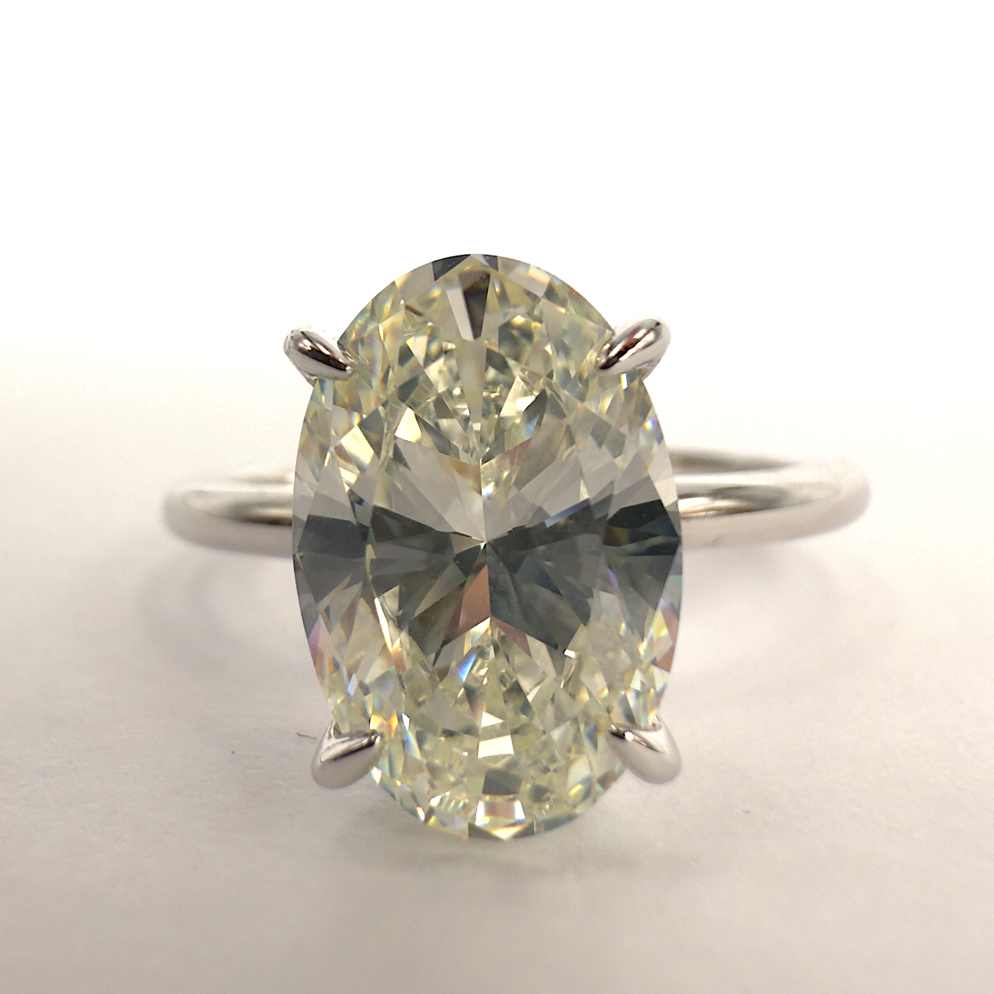 Sterling Silver Ring with Oval Cubic Zirconia & Invisible Halo